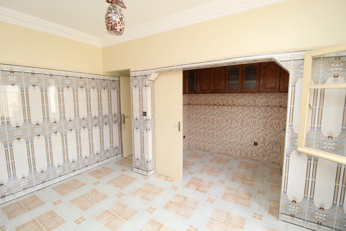 Pand met Winkel en Appartementen in Hay Al Wafa, Agadir