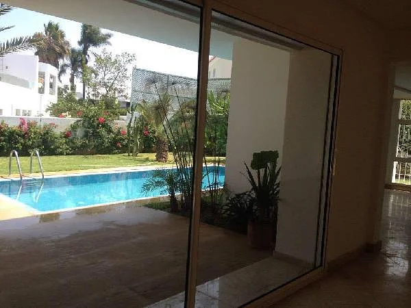 Te Huur: Luxe Villa met Tuin en Zwembad in Souissi, Rabat
